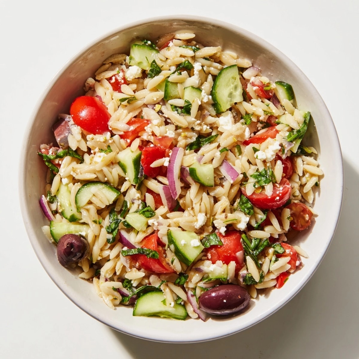 Bright and flavorful Mediterranean Orzo Bowl recipe: Imagine the lemon-herb aroma with each delicious bite.