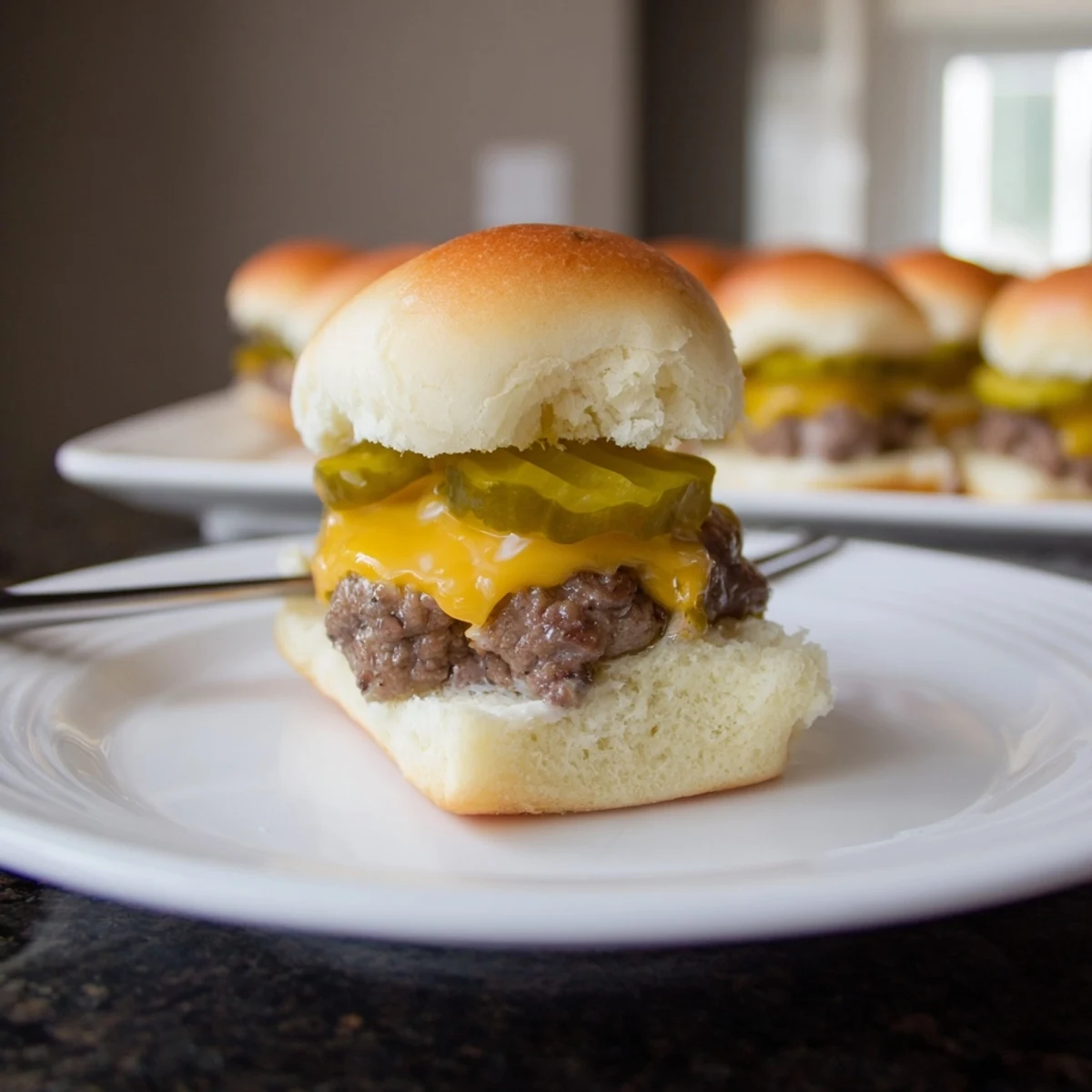 Juicy Dill Pickle Ranch Sliders topped with creamy ranch and zesty pickles ready to devour.  