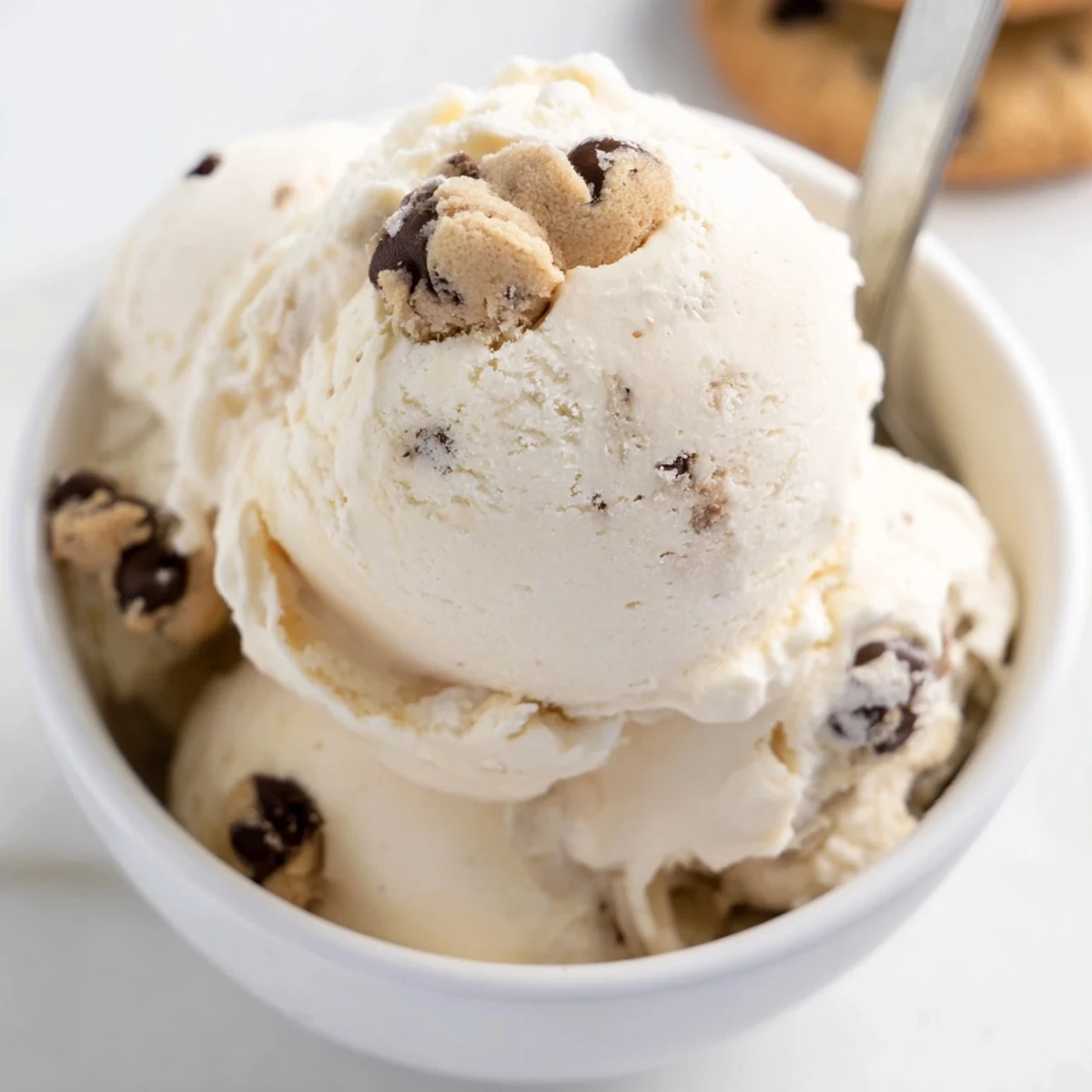 Refreshing Cottage Cheese Ice Cream with Cookie Dough, topped with mini chocolate chips.