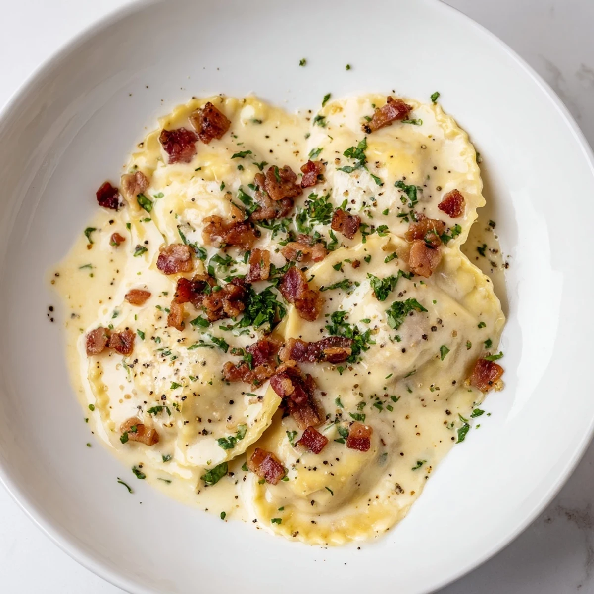 Creamy Olive Garden Ravioli Carbonara with crispy pancetta, perfect for a cozy, Italian dinner.