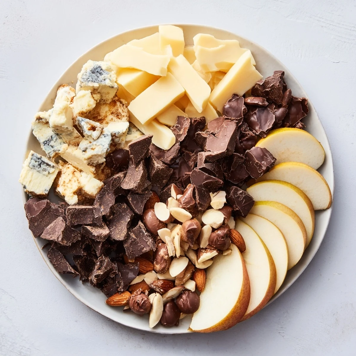 Rustic platter of Fireside Comfort & Cocoa with warm mugs and dark chocolate arranged beautifully.