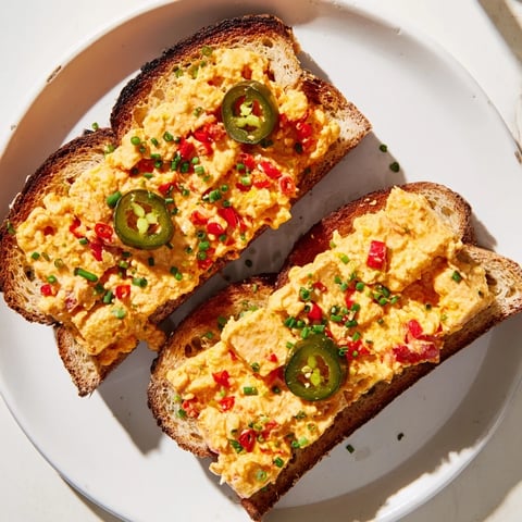 Warm, bubbly Pimento Cheese & Jalapeño Pull-Apart Grilled Cheese with golden, crusty bread and melted cheese.