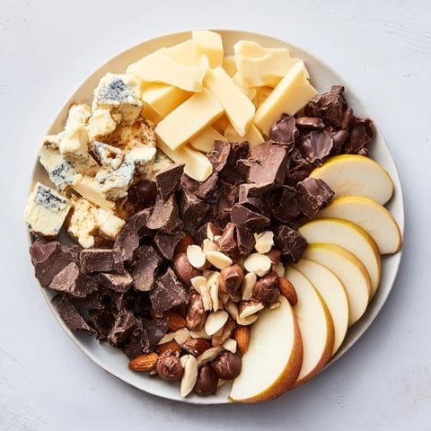 Rustic platter of Fireside Comfort & Cocoa with warm mugs and dark chocolate arranged beautifully.