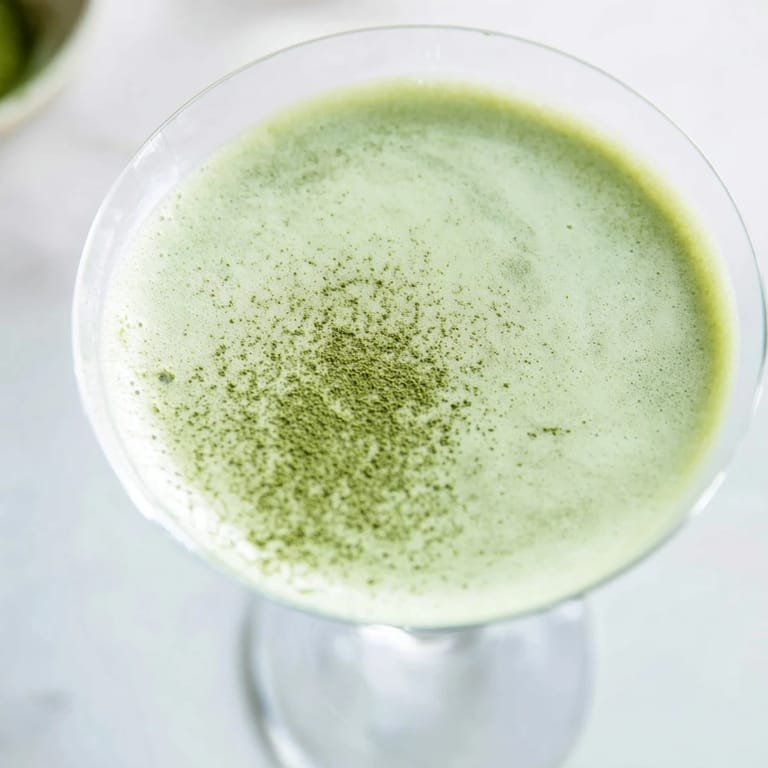 A beautiful close-up of a refreshing Matcha Martini, ready to sip with earthy notes.